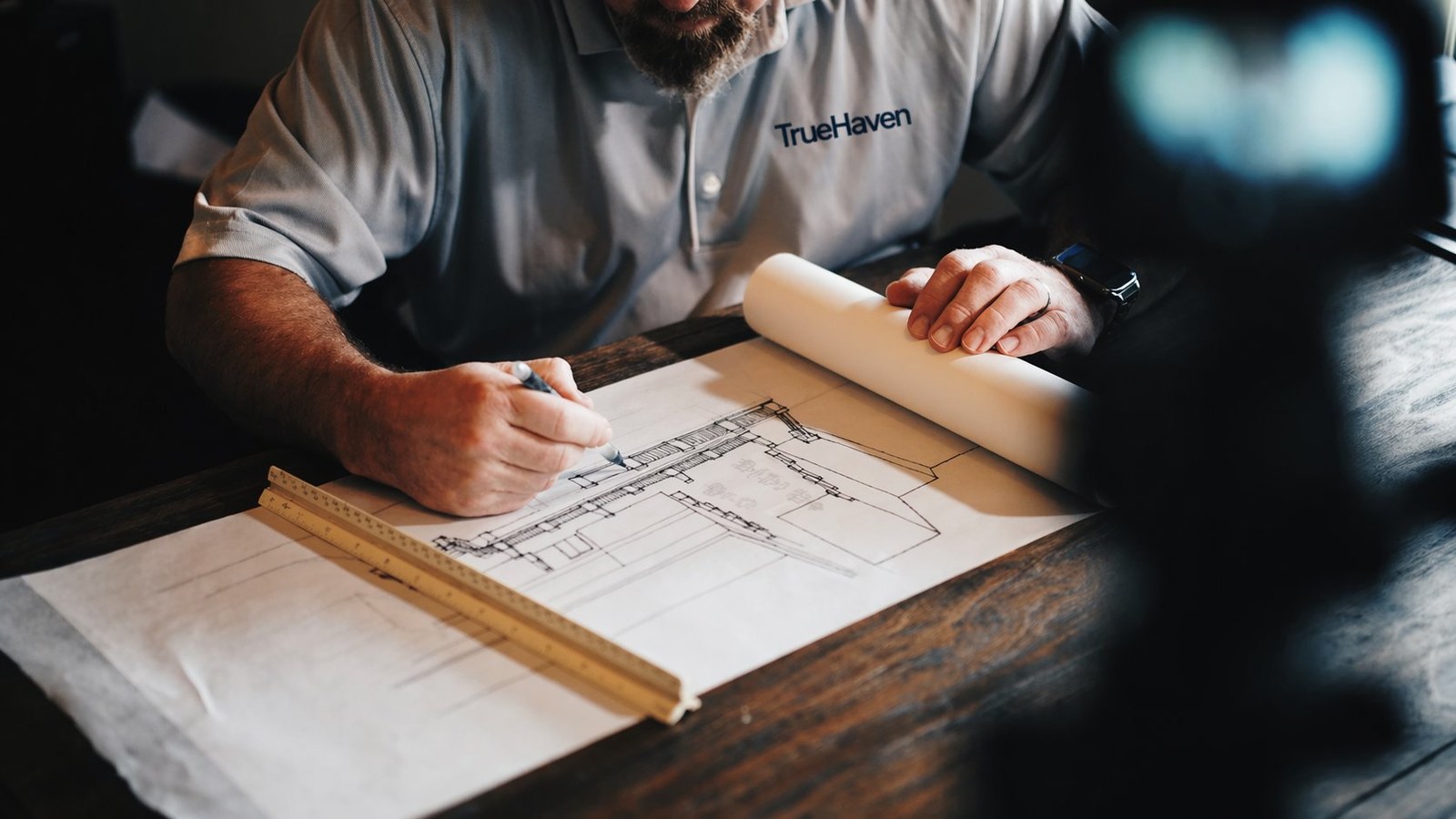 An architect reviewing building plans